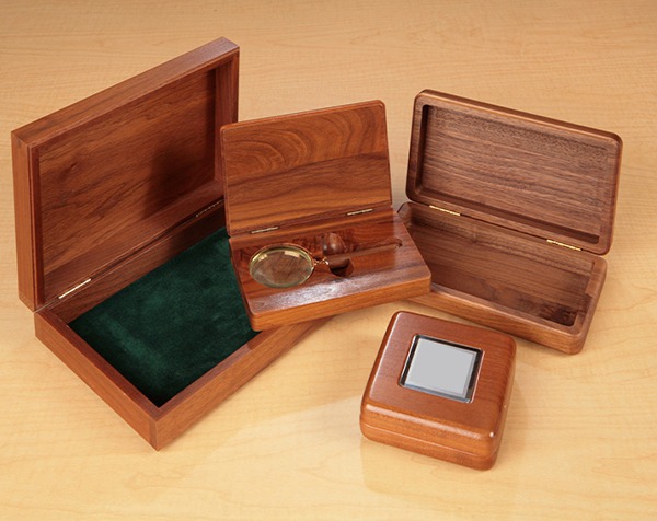 High-end custom wooden boxes with hinged tops, felt liners, and precision-cut interior slots, available in bulk for luxury packaging, premium retail displays, and corporate gifts.